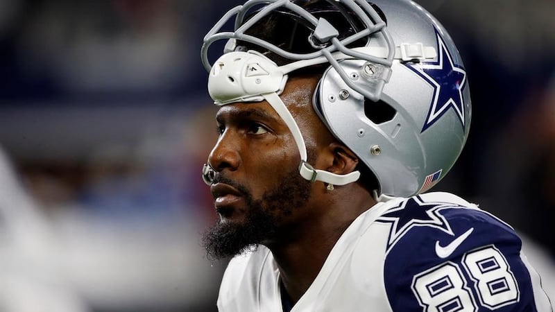 Dallas Cowboys' Dez Bryant warms up before an NFL football game against the Washington...