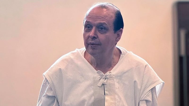 FILE - Texas lawmakers meet with Robert Roberson at a prison in Livingston, Texas, Sept. 27,...