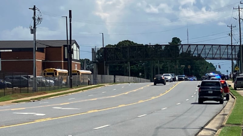 Authorities say a suspect is in custody after a Warner Robins High School student was injured...