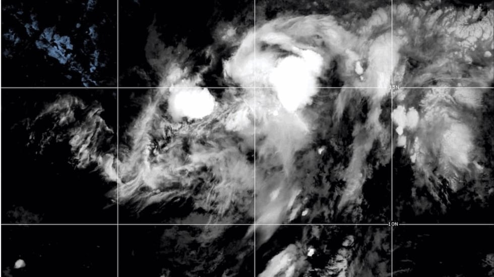This NOAA satellite image taken at 11:04 a.m. EST on Thursday, Aug. 13, 2026, shows Tropical...