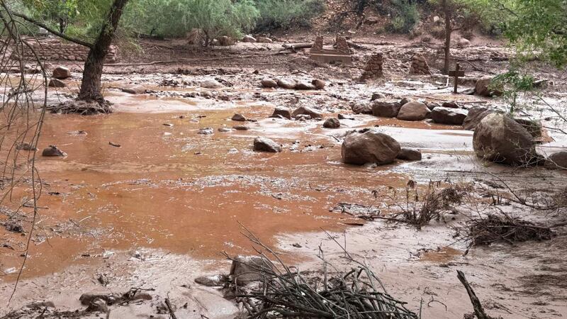 Remnants of stone bridge pylons remain along Bright Angel Creek following a flash flood that...