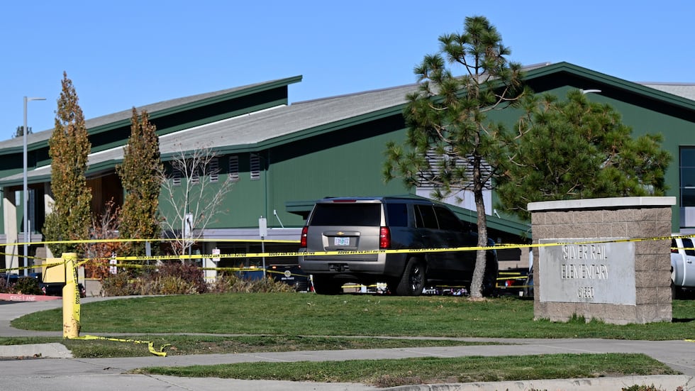 Police tape is placed outside Silver Rail Elementary school, where a shooting took place, on...