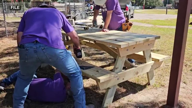Church group builds playground for Family Crisis Center transitional housing
